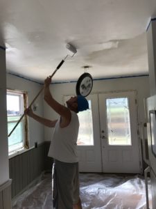 John Using That Arm Strength to Paint the Ceiling After Popcorn Texture Has Been Freshly Removed From It